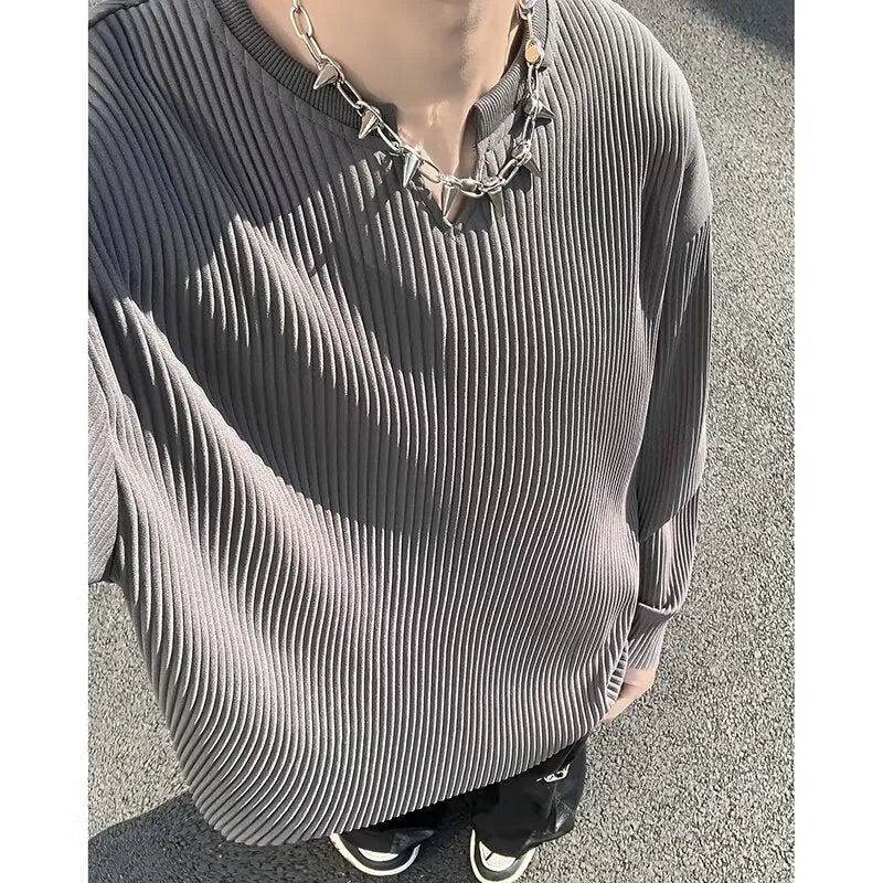 Plus size women's striped texture pullover top in loose fit with long sleeves