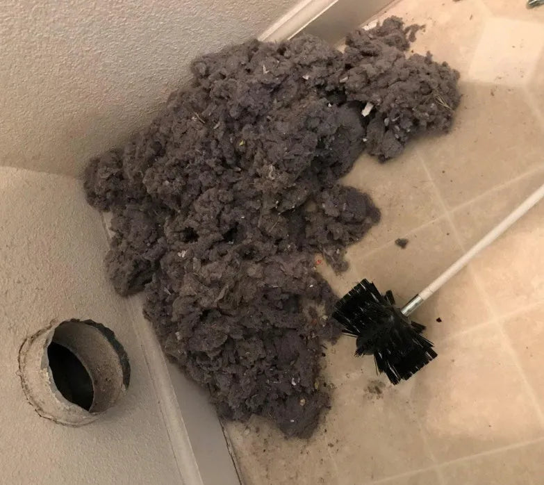 Flexible chimney cleaning brush with nylon bristles, extended to 600mm length for duct and pipe cleaning.