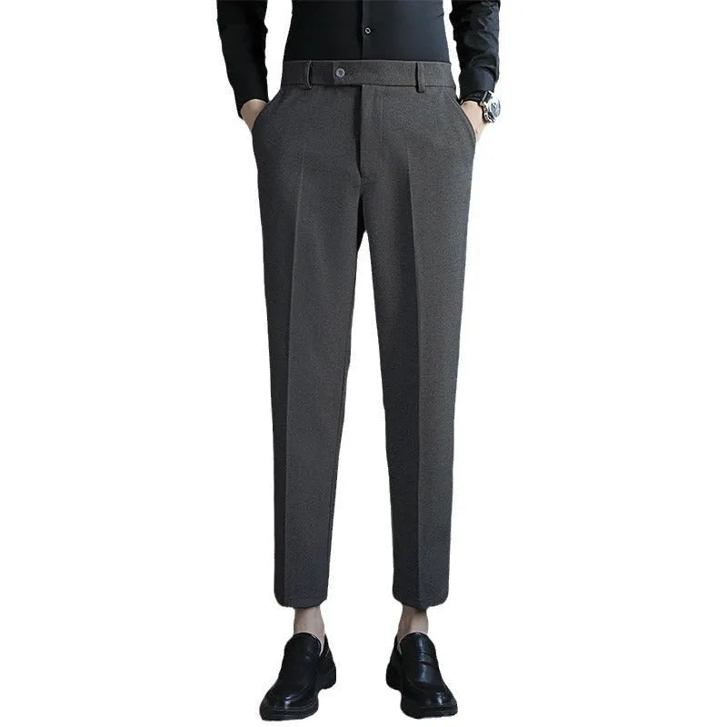 Straight cut brown corduroy trousers with elastic waistband shown front and back views
