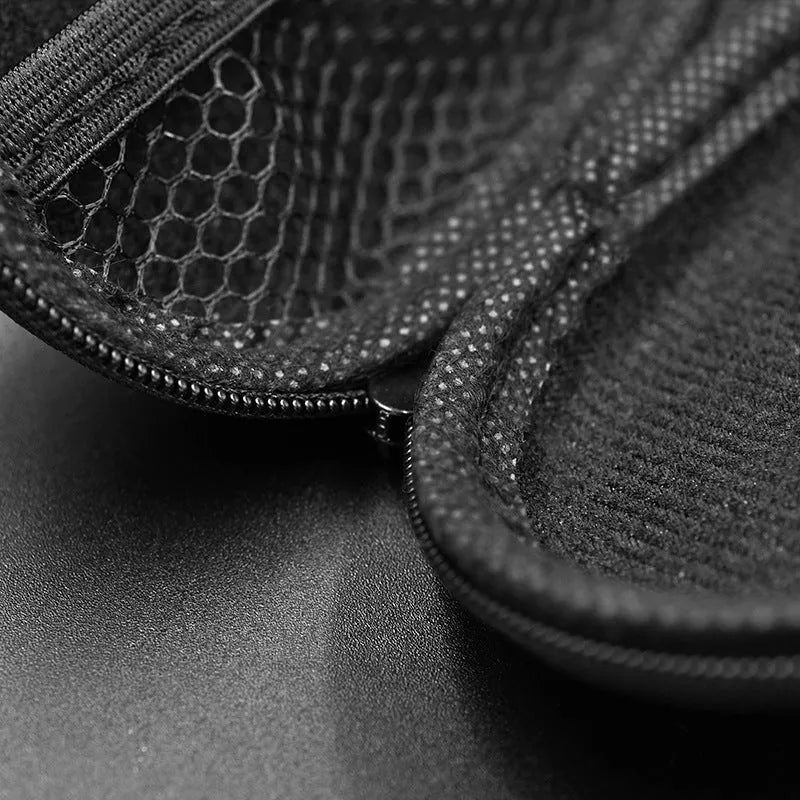 Black oval portable leather storage bag for earphones compatible with EDX PRO and ZEX PRO models