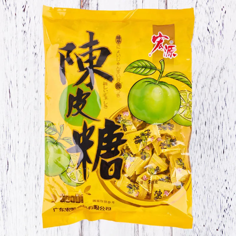 Three bags of hard candy in guava, plum, and tangerine peel flavours with net weights displayed