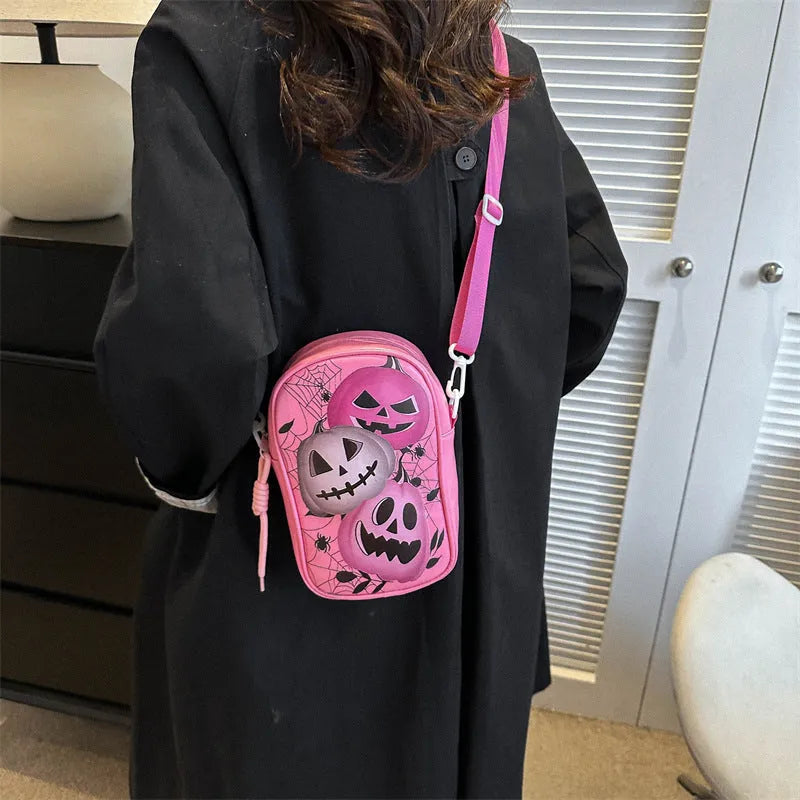 Halloween graffiti phone bag with pumpkin ghost bat cartoon print, black colour, crossbody strap.