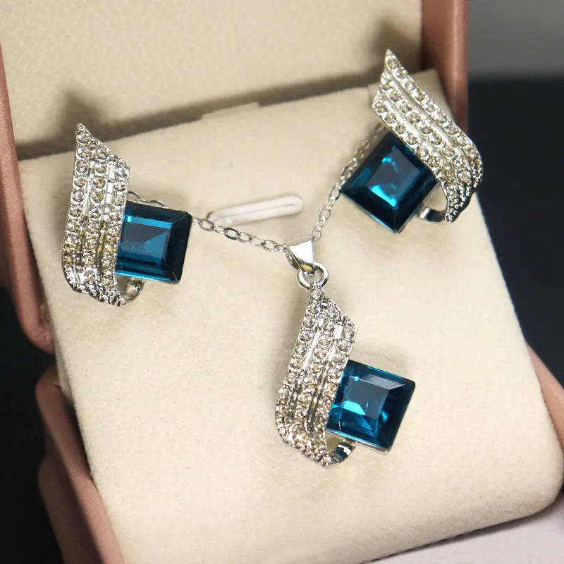 Women's necklace and earring set with cross chain design in alloy and glass with electroplated finish