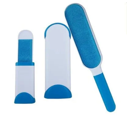 Blue reusable pet hair remover brush with self-cleaning base for removing fur from a grey sofa.