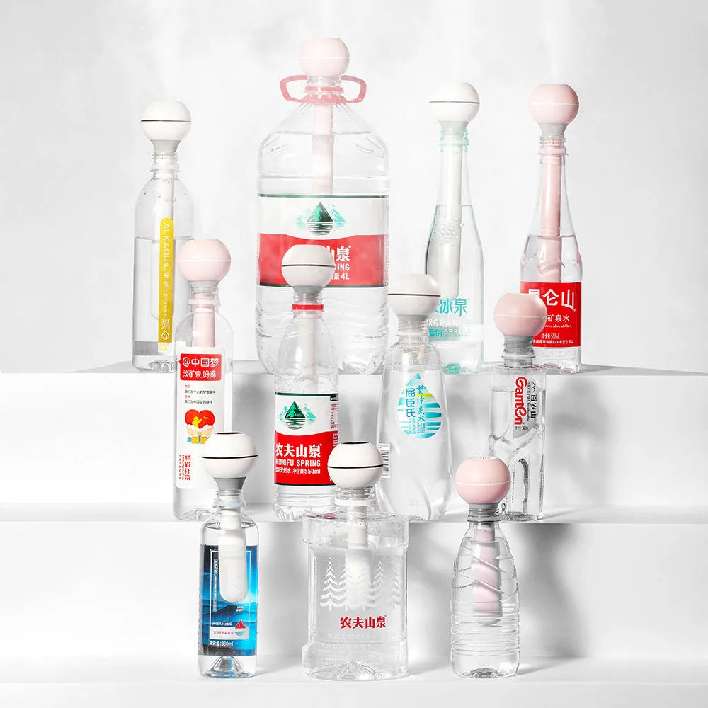 Pink and white column-shaped USB-powered ultrasonic humidifier with 1 litre water tank