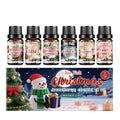 Christmas aromatherapy essential oil gift set showing six 10ml bottles with festive scents including gingerbread and mistletoe