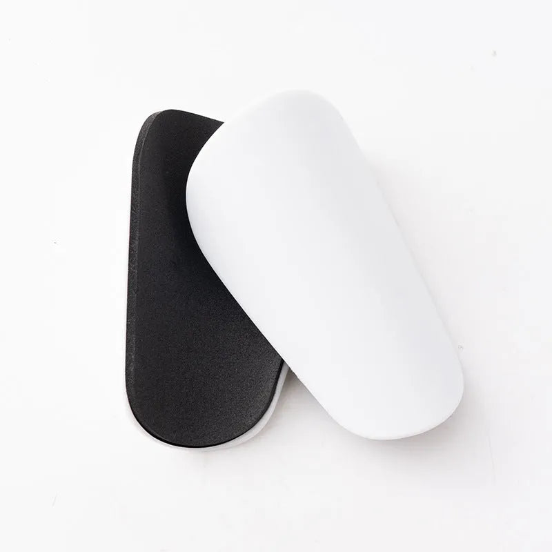 PU mini shin guards in black, white, red and blue for football and outdoor sports