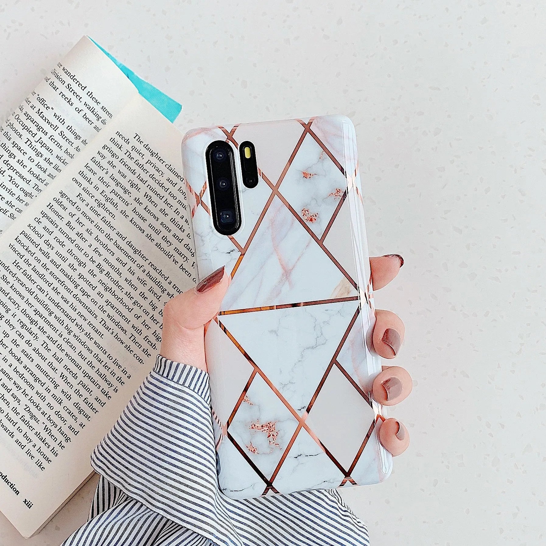 Electroplated marble pattern TPU phone case for Huawei and Samsung mobile phones in various colours.