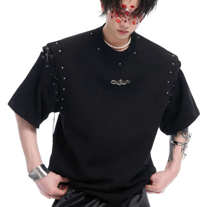 Women's black short sleeve top with a white lace-up cutout detail on the side.