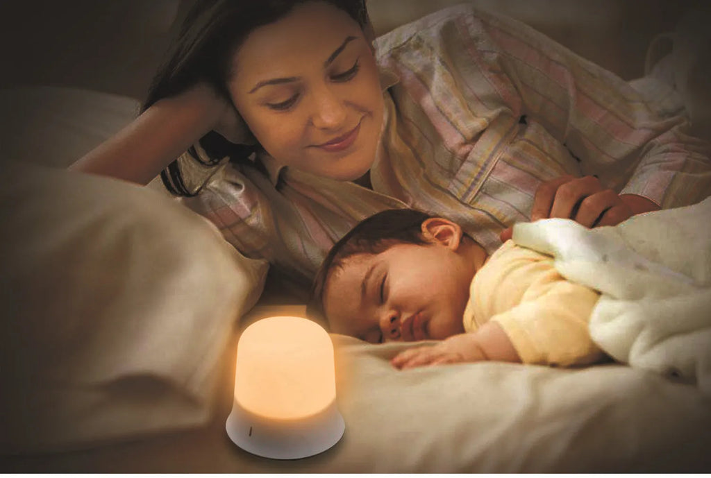 White bedside nursing night light with touch controls for dimming and colour adjustment