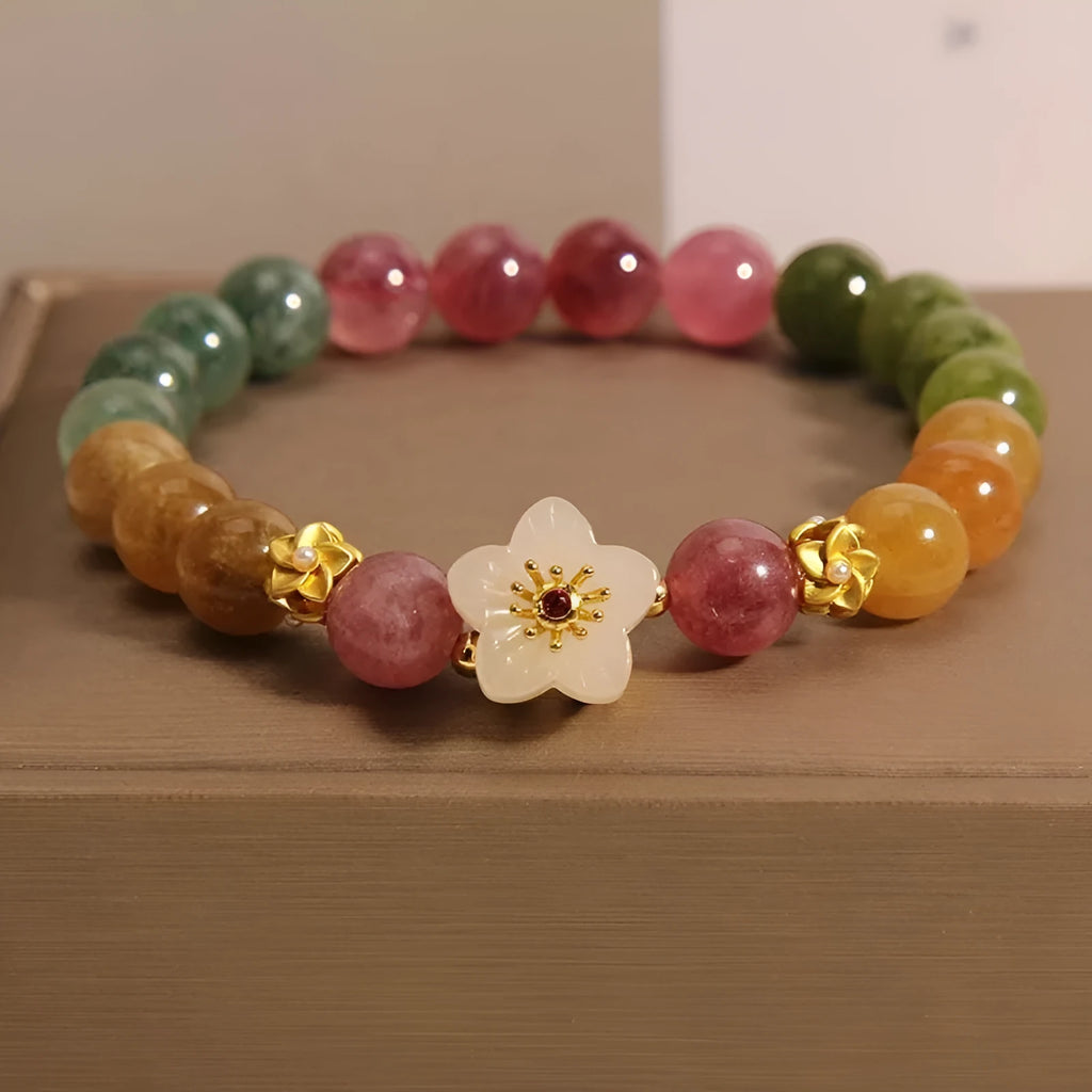 Tourmaline bracelet with natural stones in floral design and electroplated geometric setting