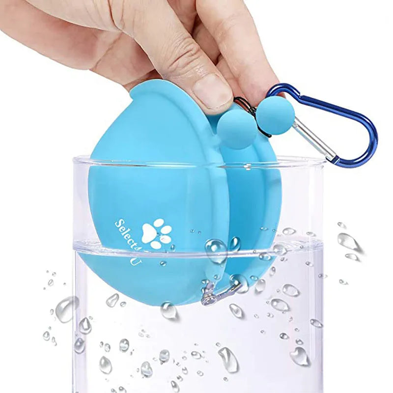 Yellow silicone dog training treat waist bag with hook-and-loop closure, shown with treats.