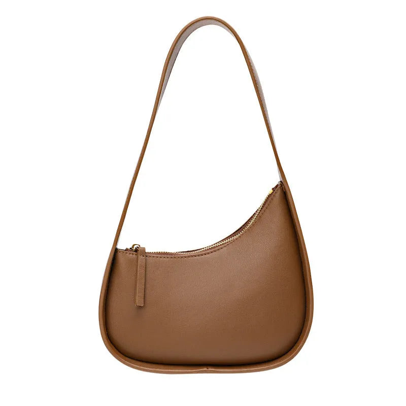 Half moon shaped leather women's shoulder bag with wide strap