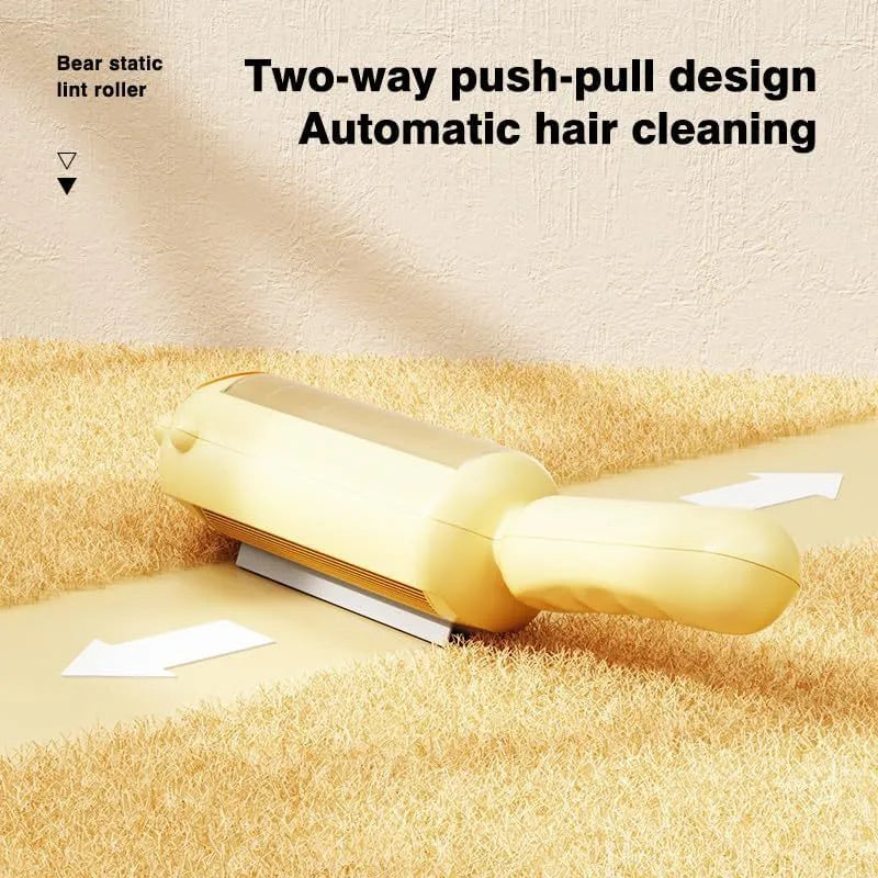 Blue pet hair remover roller with self-cleaning base on a carpet next to a dog.