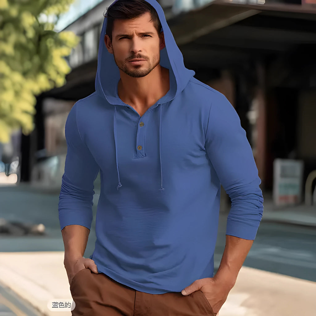 Cotton long sleeve pullover hoodie top in apricot colour on a hanger
