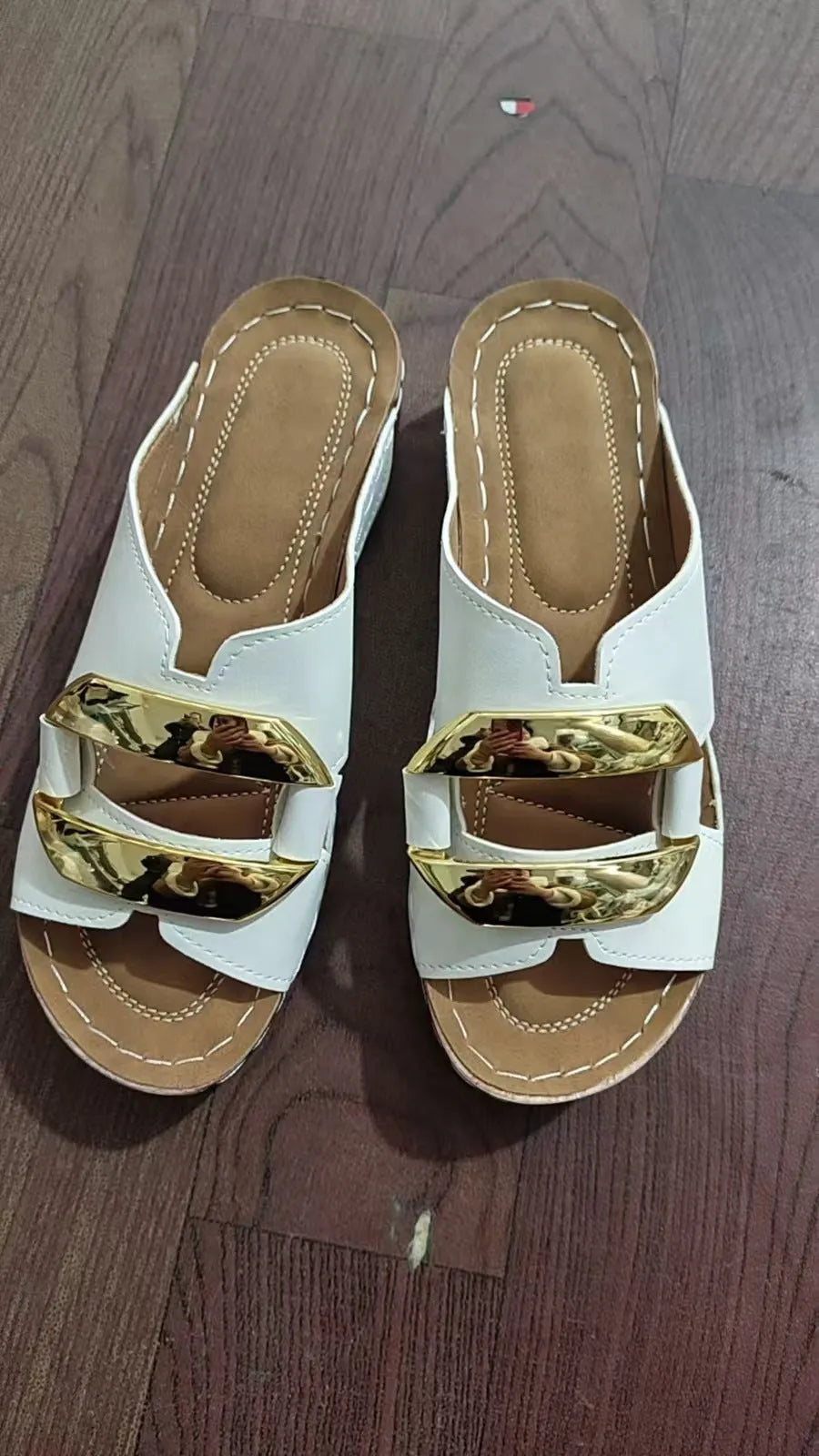 Women's Roman style platform sandals in white, black, khaki, and blue with a metal detail.