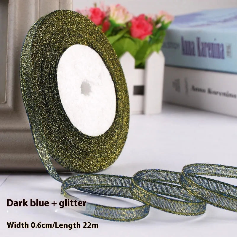 Roll of polyester gift packaging ribbon with 0.6cm width and 22 metre length in various colour options