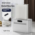 Intelligent induction dental floss box in dark grey, light grey or gold with automatic pop-up mechanism