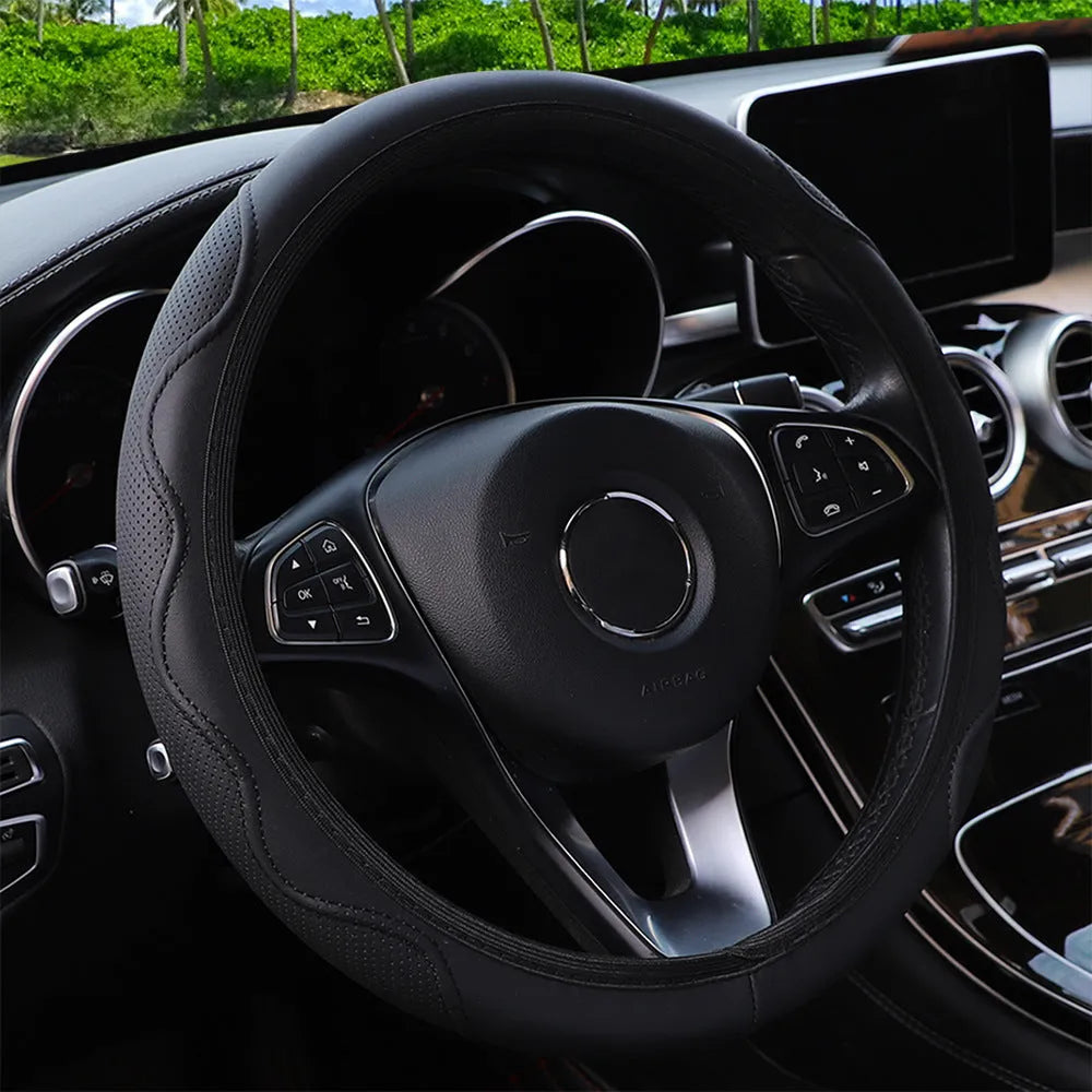Black elastic PU leather steering wheel cover with a corrugated pattern, shown fitted on a car wheel.