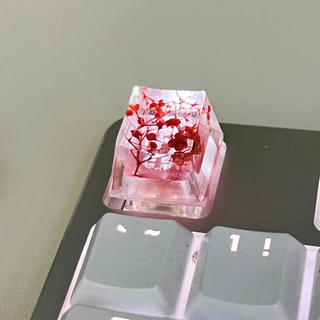 High transparency starry sky design resin keycap for mechanical keyboards in green colour.