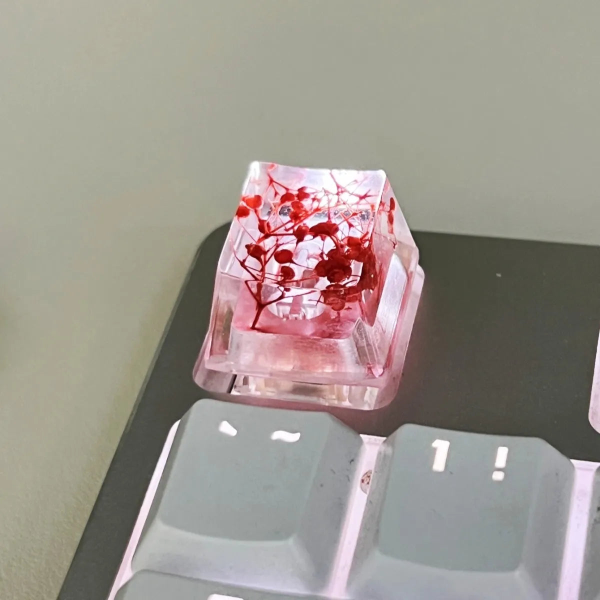 High transparency starry sky design resin keycap for mechanical keyboards in green colour.
