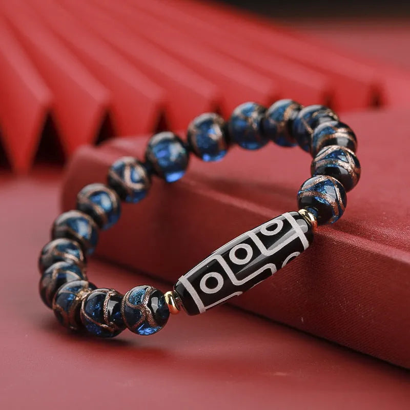 Handcrafted coloured glaze bracelet with Chinese auspicious patterns and snake beads in 10mm, 12mm, or 14mm sizes.