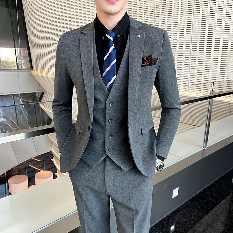 Slim fit business suit for men in black or dark grey with British style casual design