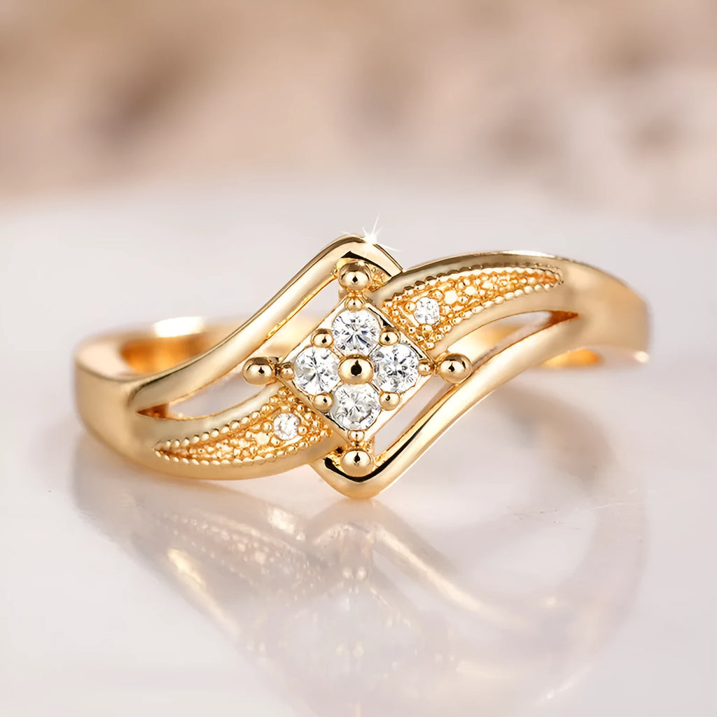 Yellow gold diamond shape copper ring with micro inlaid zircon geometric ornamentation showing line and quadrangle patterns