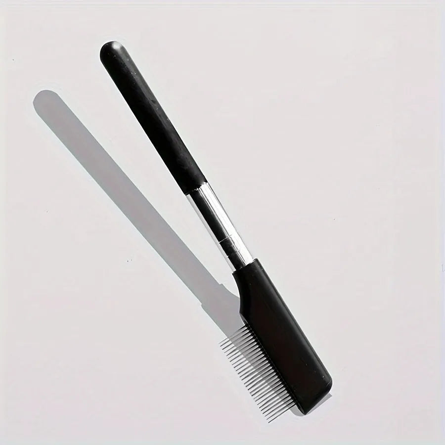 Black dual-head pet grooming brush with soft bristles and a comb, featuring an ambidextrous handle.