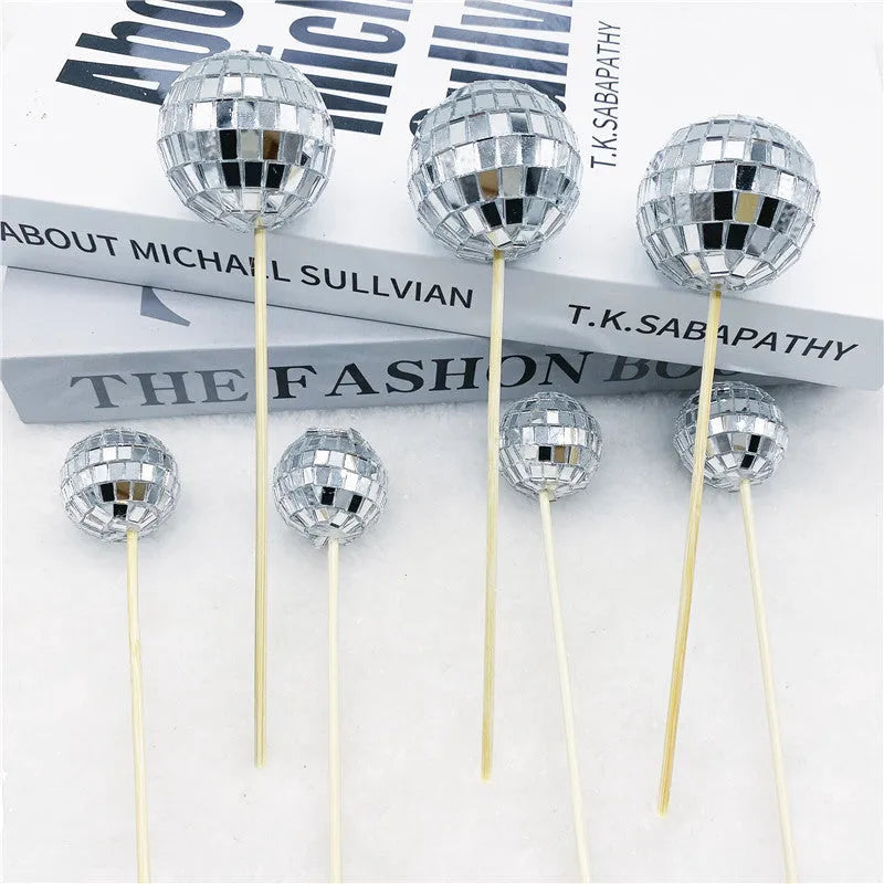 Glass disco ball cake decoration on wooden stick in multiple sizes for birthday cakes