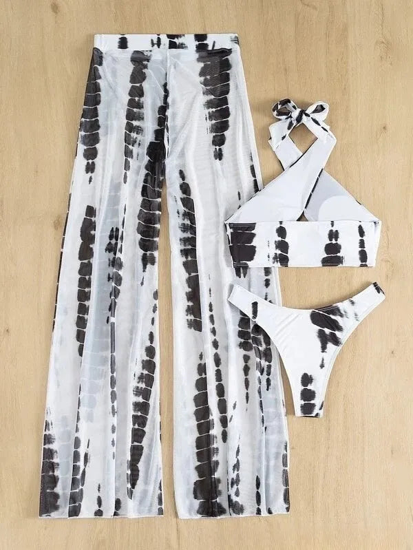 Three-piece women's swimsuit set with printed top, bikini underpants, and mesh trousers in blue or black