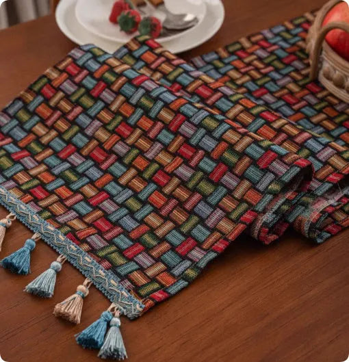 European retro cotton linen style table flag with handwoven tassels in blue ginkgo leaves pattern on sideboard