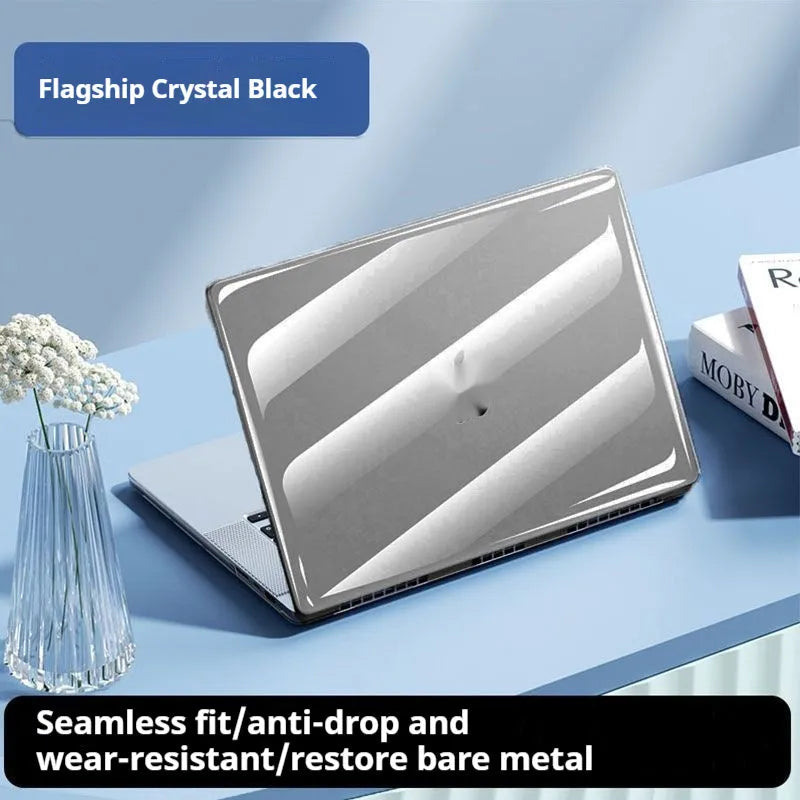 Transparent plastic protective shell for MacBook Air and Pro laptops on a table