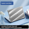 Transparent plastic protective shell for MacBook Air and Pro laptops on a table