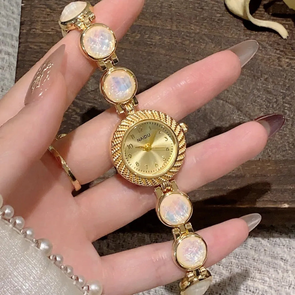Women's round quartz watch with 25mm dial in one of six colours: milky white, dark green, purple, light green, cherry pink, or orange pink.