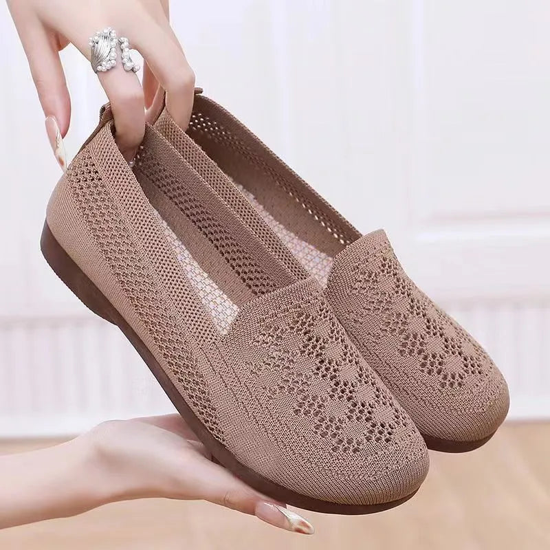 Beige low-top mesh casual trainers for women with a round toe and flat PVC sole.
