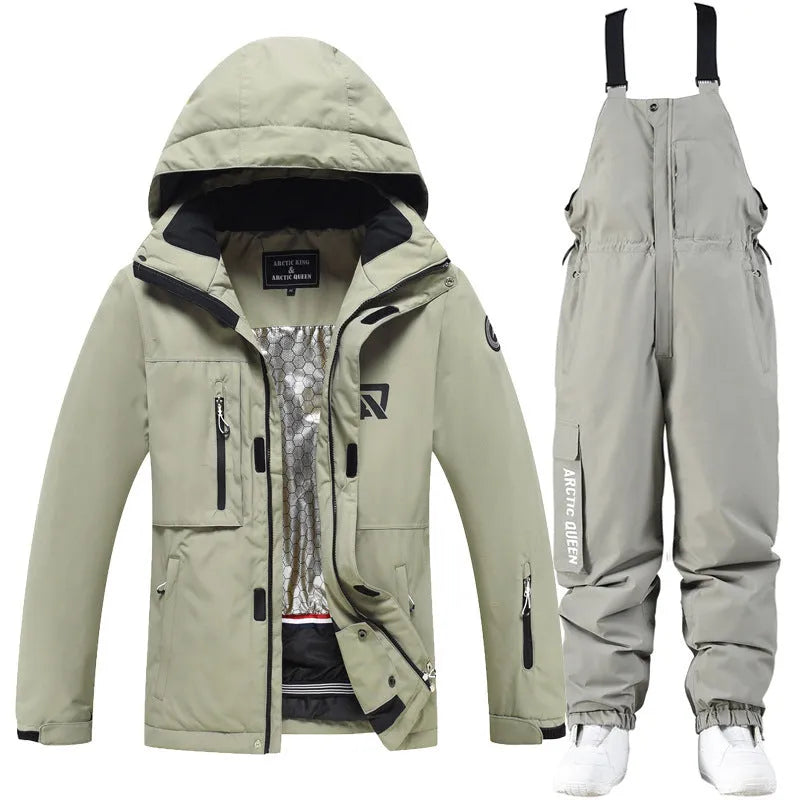 Men's and women's waterproof ski suit in blue with black trousers for winter snow sports