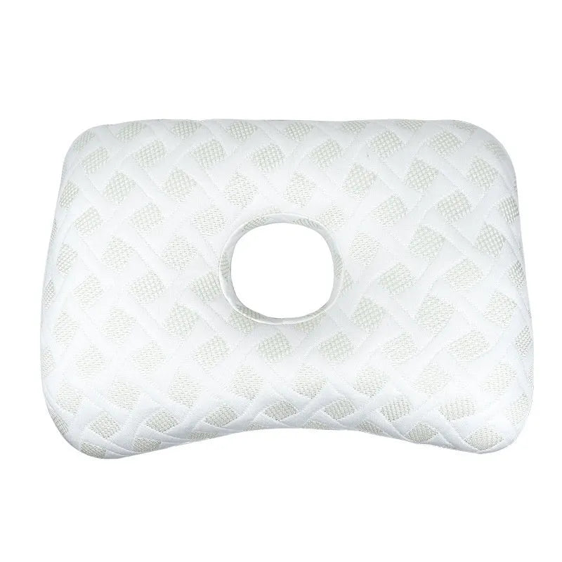 Beauty salon single hole ear pillow for adults in grey colour on a treatment bed.