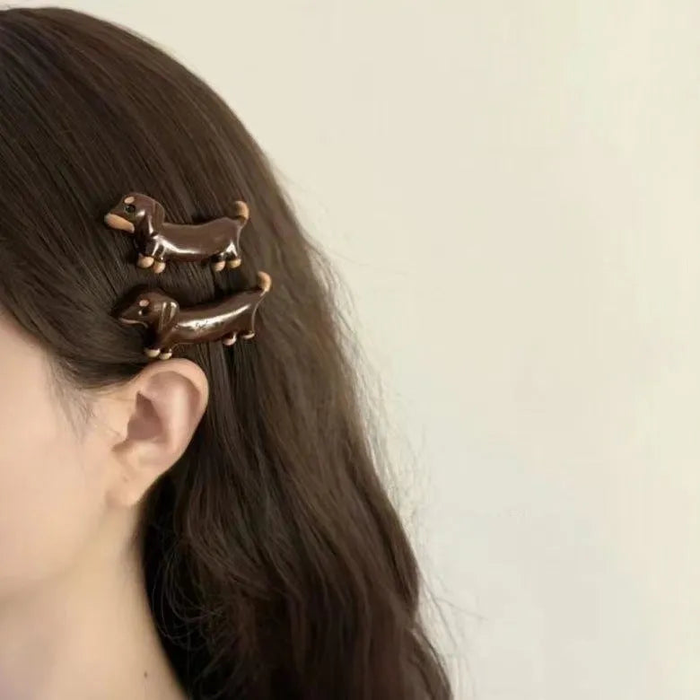 Dachshund dog-shaped hair barrettes with electroplated metallic finish and cute animal styling