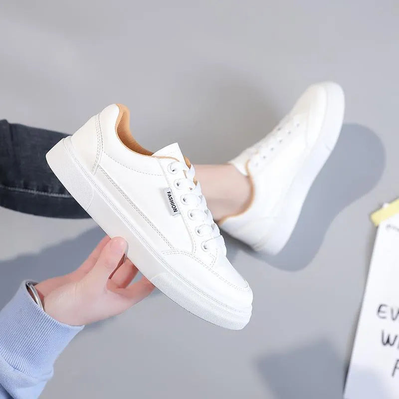 Korean style women's low-top sneakers in white and brown colours with artificial PU upper