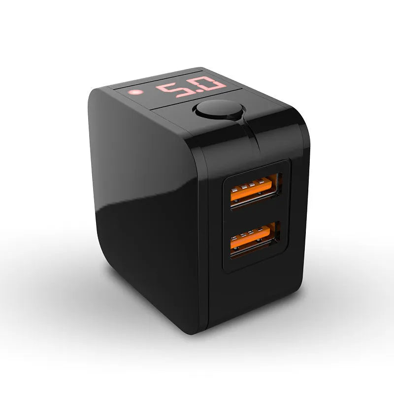 Black 5V2A travel power adapter with dual USB ports and digital display showing UK plug type