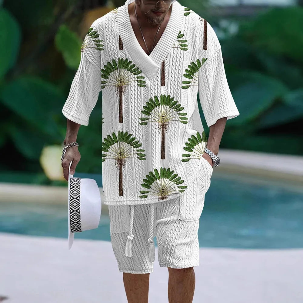 Man wearing a loose-fitting short sleeve top and matching casual shorts from a polyester suit set.
