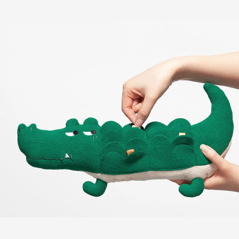 Green plush dog toy measuring 35cm long with soft texture for children's play
