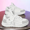 Men's white chunky sneakers with cartoon pattern, thick rubber sole, and synthetic leather upper