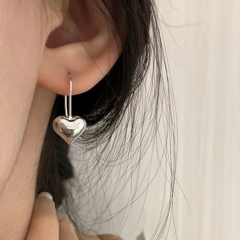 Silver heart-shaped Korean style earrings with 3D glossy finish and copper construction