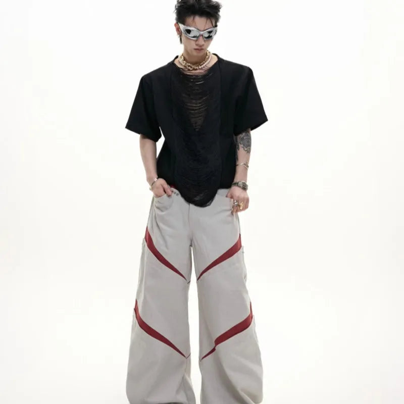 Loose black polyester men's t-shirt with 3D cut tassel details and hollow out design