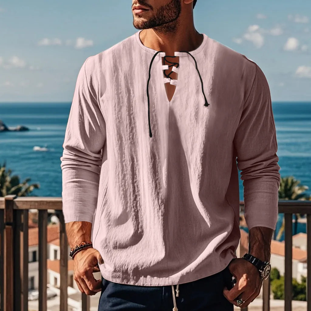Solid colour cotton linen beach ruff shirt in a loose pullover style, shown in light blue