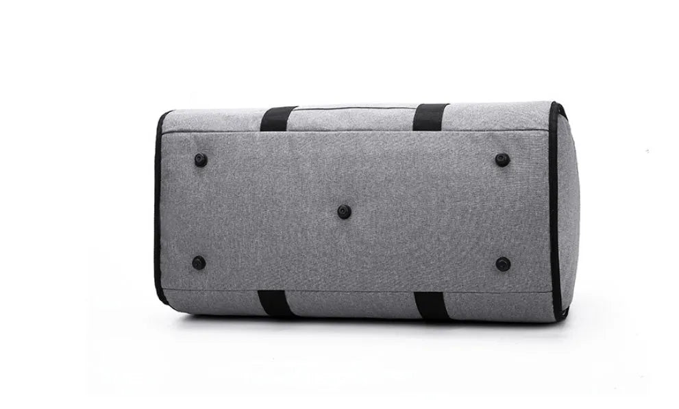Medium sized red cylinder travel bag with a zipper, made from Oxford cloth.