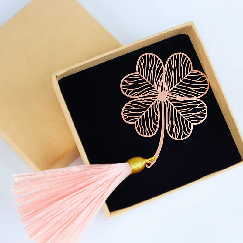 Brass metal hollow plated bookmark with leaf design and rose gold tassel