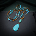 Women's turquoise imitation mineral pendant necklace with large water drop design on ball bead chain